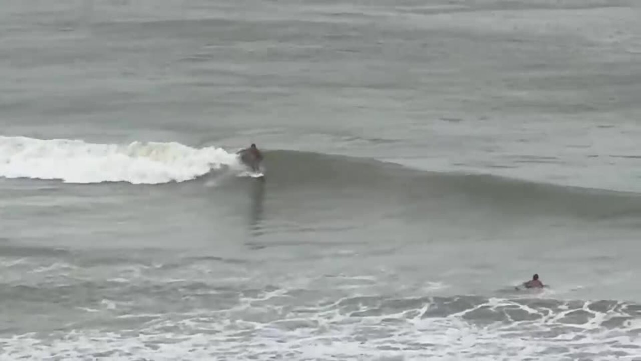 'Surf's Up': Enthusiastic Florida Surfers Take on Pre-Hurricane Waves