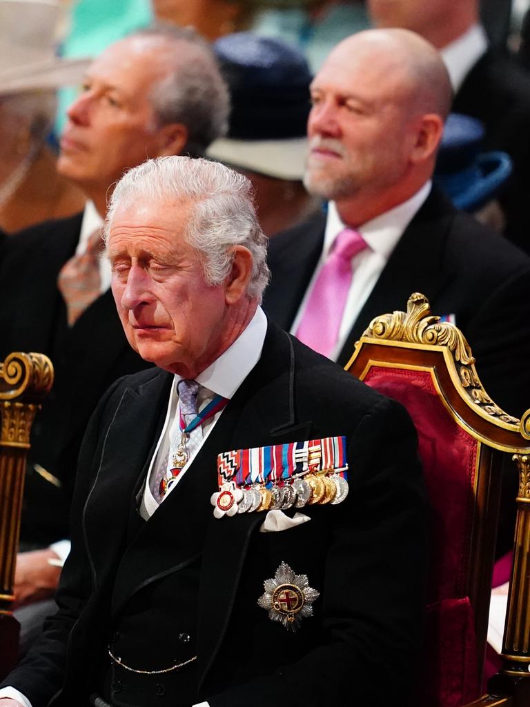 And the husband of Zara shown again seated behind Prince Charles at the Thanksgiving Service. Picture: Aaron Chown/WPA Pool/Getty