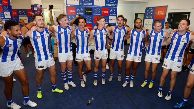 The Roos celebrate after the 15-point win. Picture: AFL Photos/Getty Images