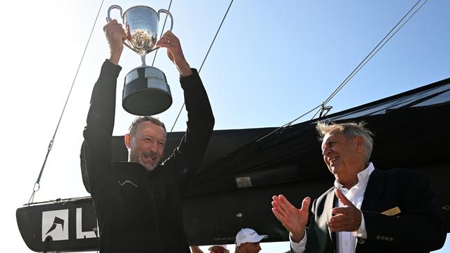 HOBART, AUSTRALIA - DECEMBER 28: Christian Beck, Skipper of LawConnect celebrates winning line honours at the 2023 Sydney to Hobart, on December 28, 2023 in Hobart, Australia. (Photo by Steve Bell/Getty Images)