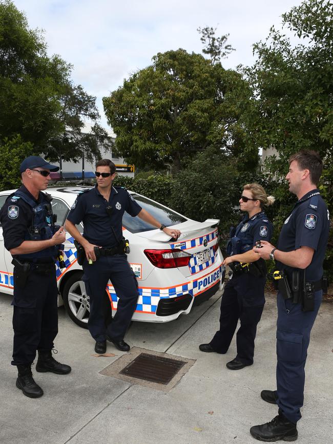 Rapid Action Police officers during a briefing ahead of a raid in Nerang.