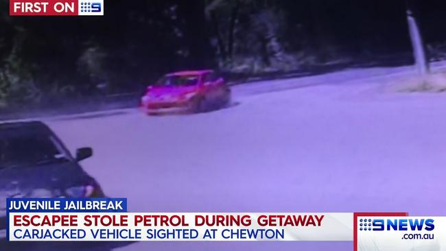 A Red Hatchback driven by a Malmsbury escapee does a petrol drive off at Chewton petrol station. Picture: Channel Nine.