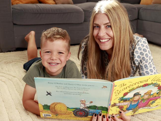 WEEKEND TELEGRAPHS SPECIAL. FEBRUARY 4, 2023. PLEASE CONTACT WEEKEND PIC EDITOR JEFF DARMANIN BEFORE PUBLISHING.Pictured at home in Manly Vale today is Ali Lowe reading with her son Atticus 5, for a story about to how to encourage a love of reading for your child. Picture: Tim Hunter.