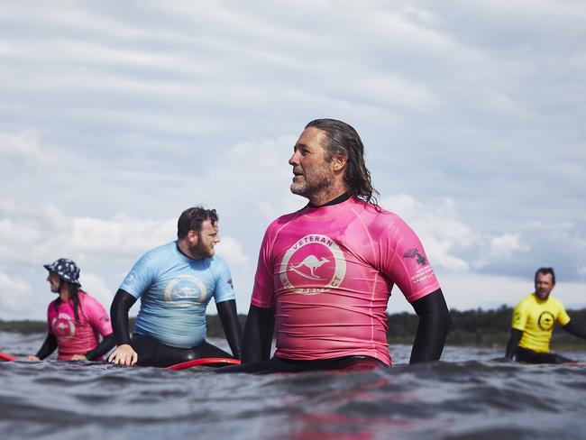 Members of the Veteran Surf Project. The VSP program consists of a ten week learn to surf course for new members, followed by continuing weekly sessions for program graduates. Picture: Rob Palmer.