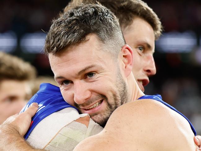 MELBOURNE, AUSTRALIA - SEPTEMBER 21: Conor McKenna of the Lions and Jarrod Berry of the Lions celebrate during the 2024 AFL Second Preliminary Final match between the Geelong Cats and the Brisbane Lions at The Melbourne Cricket Ground on September 21, 2024 in Melbourne, Australia. (Photo by Dylan Burns/AFL Photos via Getty Images)