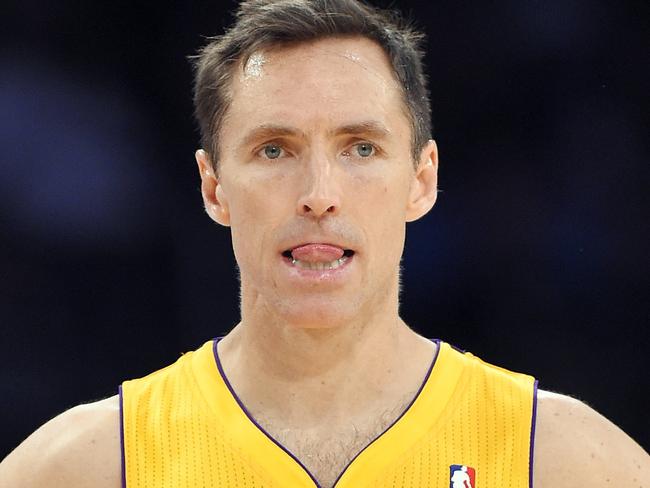 FILE - In this April 8, 2014, file photo, Los Angeles Lakers guard Steve Nash looks on during the first half of an NBA basketball game against the Houston Rockets in Los Angeles. The Lakers announced Thursday, Oct. 23, 2014, that Nash has been ruled out for the upcoming season with a back injury, putting the two-time NBA MVP’s career in doubt. (AP Photo/Mark J. Terrill, File)