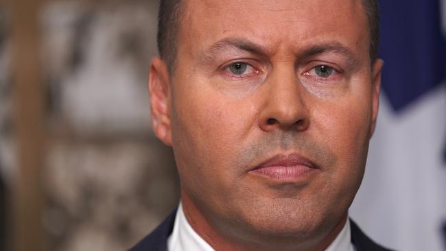 Treasurer Josh Frydenberg is seen during a press conference at his office in Melbourne, Australia, Wednesday, January 30, 2019. (AAP Image/Stefan Postles) NO ARCHIVING