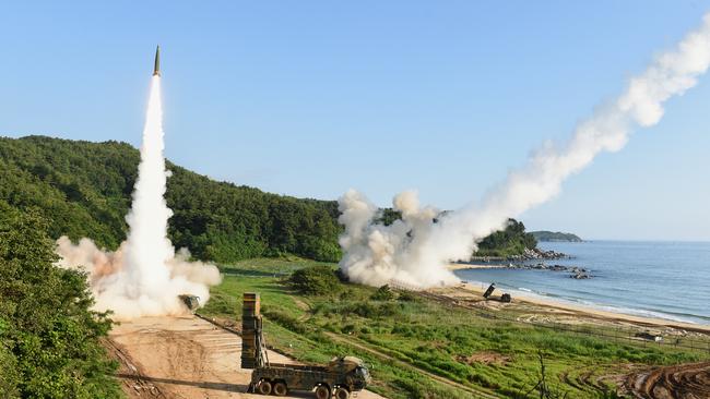 ATACMS missiles are fired simultaneously during a joint missile exercise on South Korea’s east coast in 2017. Picture: AAP