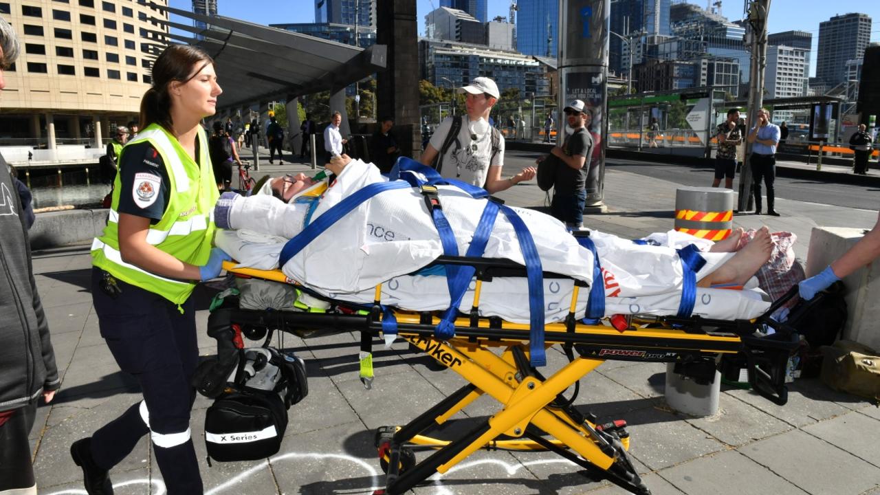 One woman was taken to hospital during the IMARC protest. Picture: Jake Nowakowski