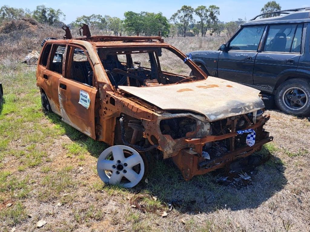 Unregistered, burnt out, five door Nissan Xtrail wagon.