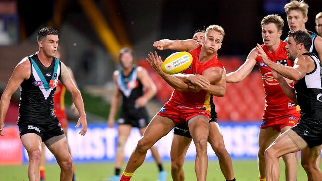 Port Adelaide beat the Gold Coast at Metricon Stadium in round one before the season was suspended. Picture: AAP Image/Darren England