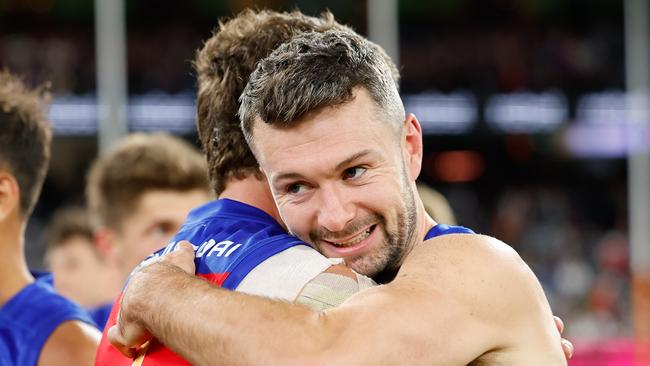 MELBOURNE, AUSTRALIA – SEPTEMBER 21: Conor McKenna of the Lions and Jarrod Berry of the Lions celebrate during the 2024 AFL Second Preliminary Final match between the Geelong Cats and the Brisbane Lions at The Melbourne Cricket Ground on September 21, 2024 in Melbourne, Australia. (Photo by Dylan Burns/AFL Photos via Getty Images)