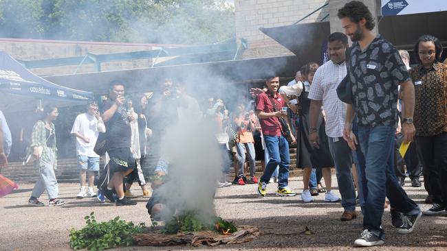 CDU welcomed the new cohort of international students to campus with a traditional smoking ceremony. Picture: Katrina Bridgeford