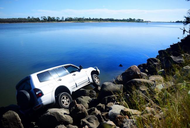 OFF ROAD: A stolen car ended up in the Burnett River near Kirby's Wall after it was allegedly taken for a joy ride. Photo: Ben Turnbull / NewsMail. Picture: Ben Turnbull