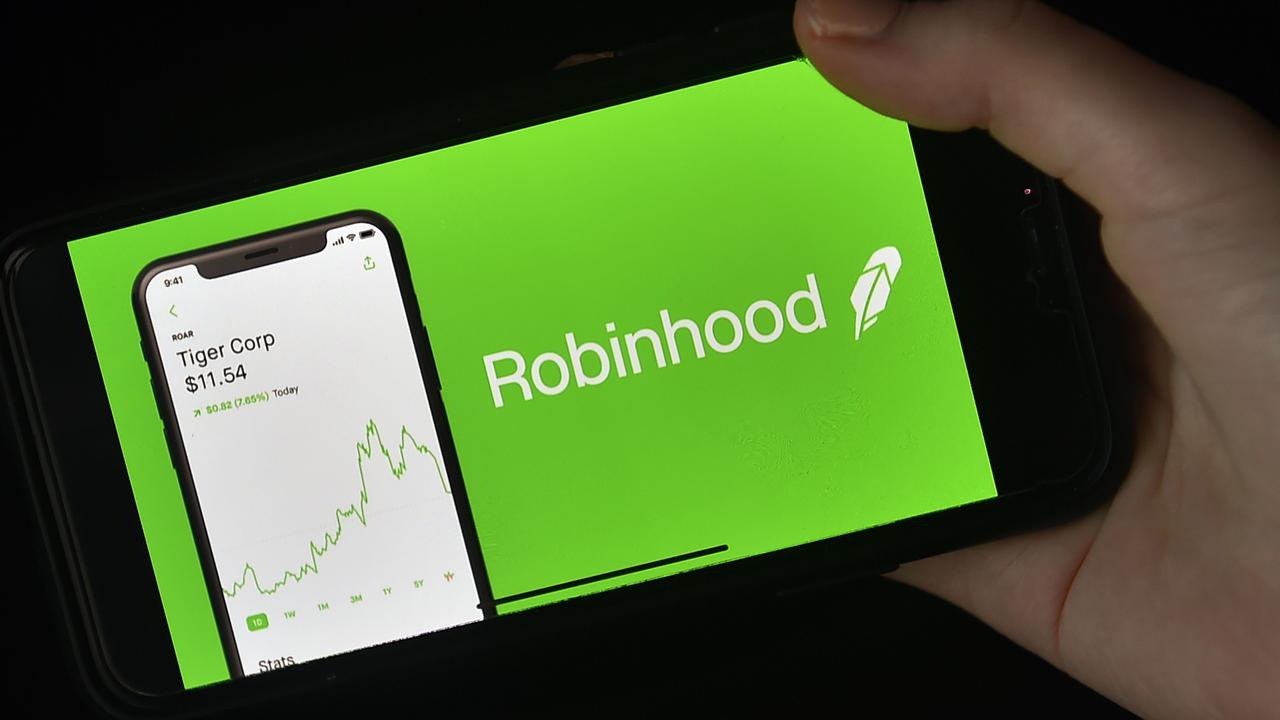 The Robinhood app was hit by lawsuits and nearly 100,000 negative Google reviews before it reversed its ban on trading on GameStop shares. Picture: Olivier Douliery/AFP