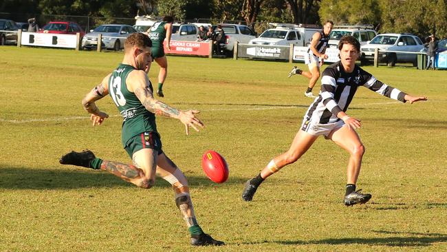 Blackwood's Rhys Sporn gets a kick away against Hahndorf on Saturday. Picture: Fi Zevenboom