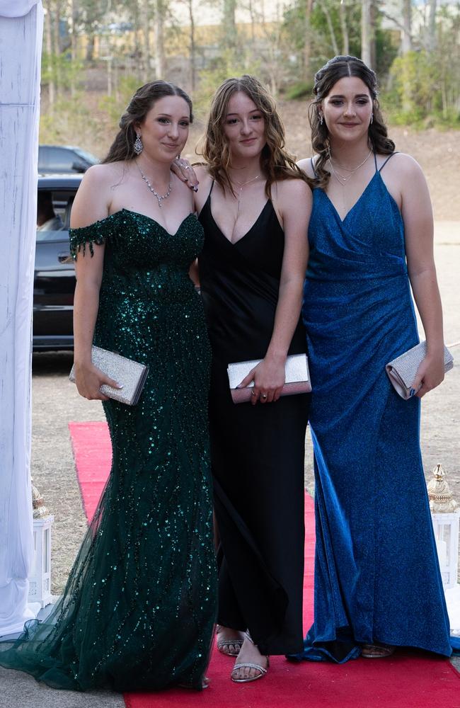 Olivia Long, Kaitlyn Wansbrough, and Meish McLellan arrive at the Gympie State High School formal 2023. November 16, 2023. Picture: Christine Schindler