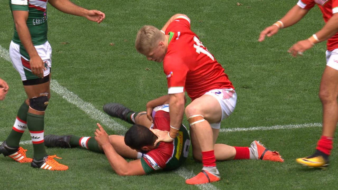 Wales player Daniel Fleming punches Lebanon's Bilal Maabarni.