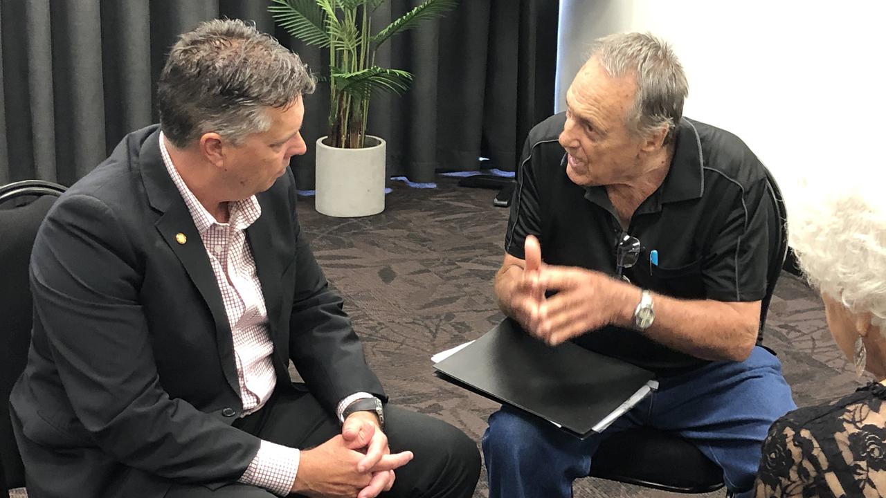 Retiree Frank Senica, 82, chats to Chair of the Health Committee and Member for Thuringowa, Aaron Harper MP at GECC following the Gladstone public hearing for the inquiry into aged care, end-of-life and palliative care, and voluntary assisted dying.