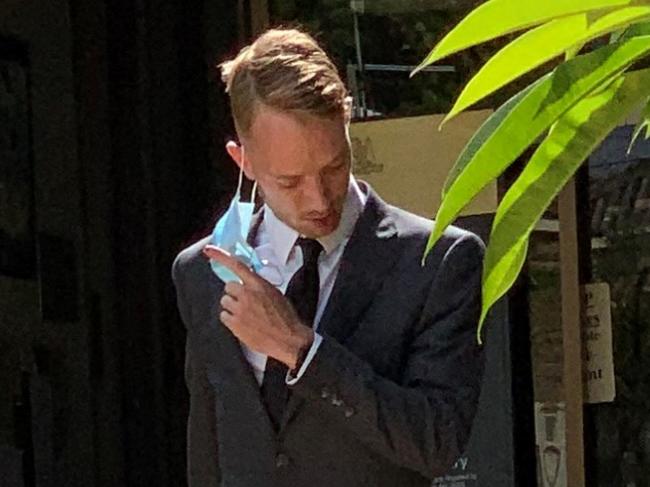 Richard Alexander Davis (right) leaves Tweed Heads Court on December 17, 2021 after being committed to trial where he will fight manslaughter charges.