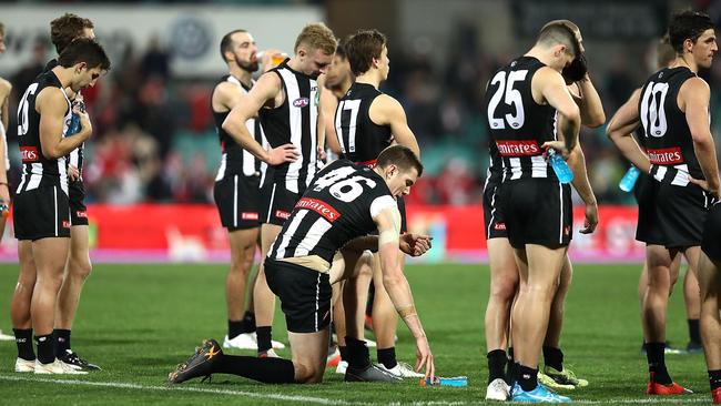 Dejected Collingwood players after the Sydney loss. Pic: Getty Images