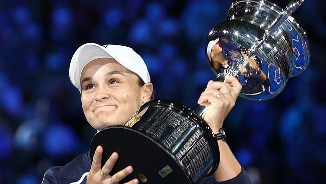 Ash Barty displays the trophy after winning the women’s final at the Australian Open tennis on Saturday night 6-3 7-6. Picture: Michael Klein