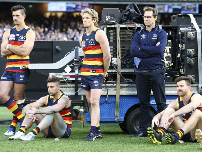 Taylor Walker, Rory Atkins, Rory Sloane, David Teague (assistant) and Andy Otten after the loss. Picture: Sarah Reed