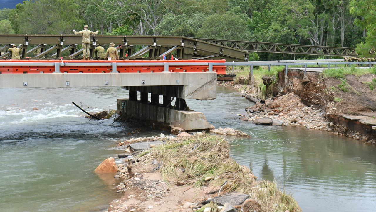 The Australian Defence Force is delivering a temporary bridge structure to support rescue efforts. Picture: Evan Morgan