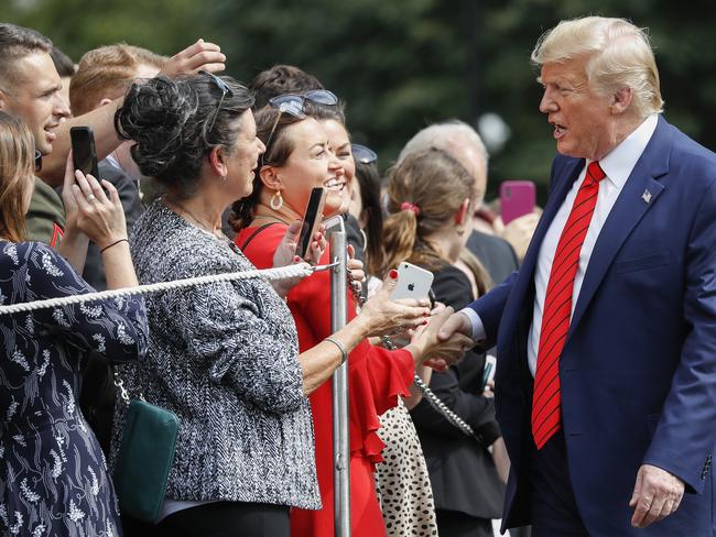 Donald Trump stops to greet supporters at the White House. Picture: AP