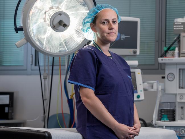 Royal Dental Hospital of Melbourne acting head of the paediatric surgery unit Dr Debra Elsby draws breath in between surgery patients on a typically busy — and sad — day of helping young patients. Picture: Jake Nowakowski