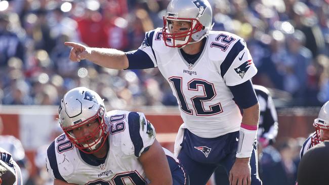 Patriots Quarterback Tom Brady pumps up the crowd about an hour