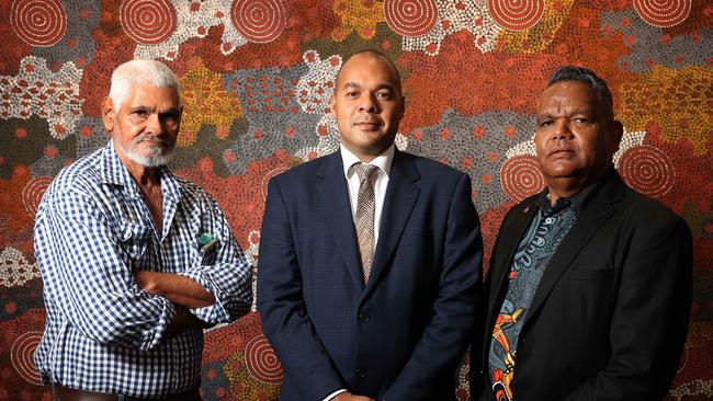 Doomadgee Aboriginal Shire Council mayor Fred O’Keefe, left, truth-telling inquiry chair Joshua Creamer and Mr Simpson on Tuesday. Picture: Liam Kidston