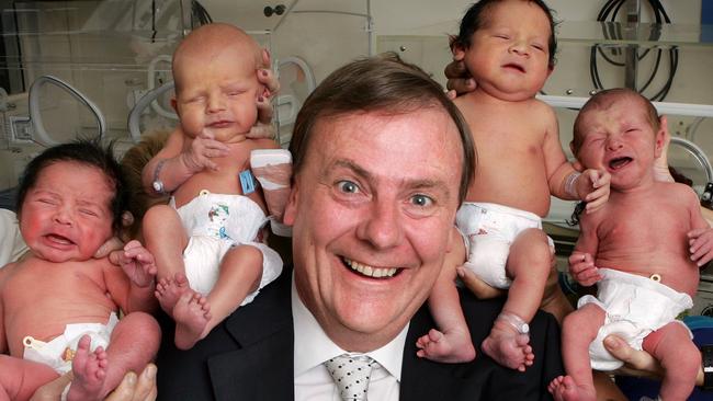 Former Treasurer Peter Costello with new born babies at Royal Women's Hospital, Melbourne.