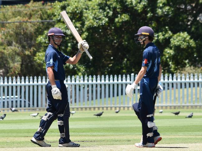 Lachlan Coy celebrates his 50 with teammate Darcy Horstead. Picture: Sean Teuma.