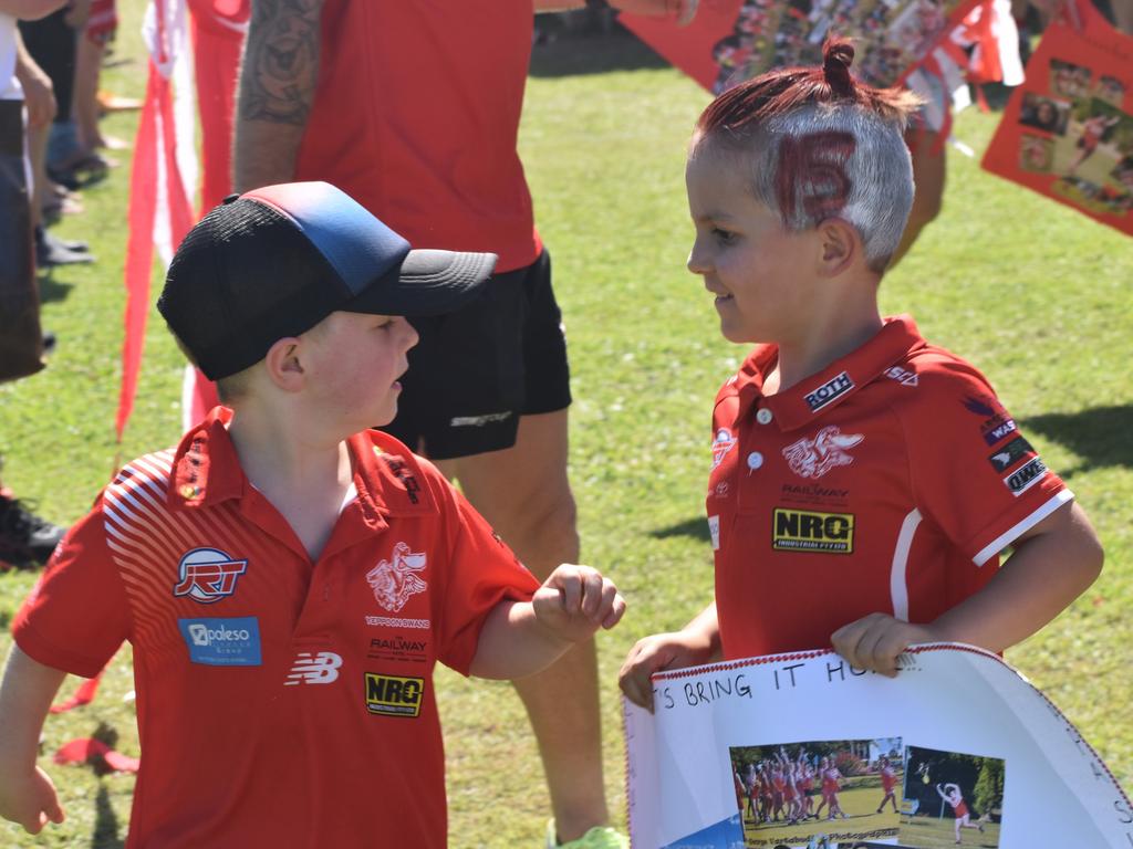 Young Yeppoon Swans' supporters Clancy Moss and Lincoln Harris at the AFL Capricornia senior grand final day at Stenlake Park, Rockhampton, on August 31, 2024.