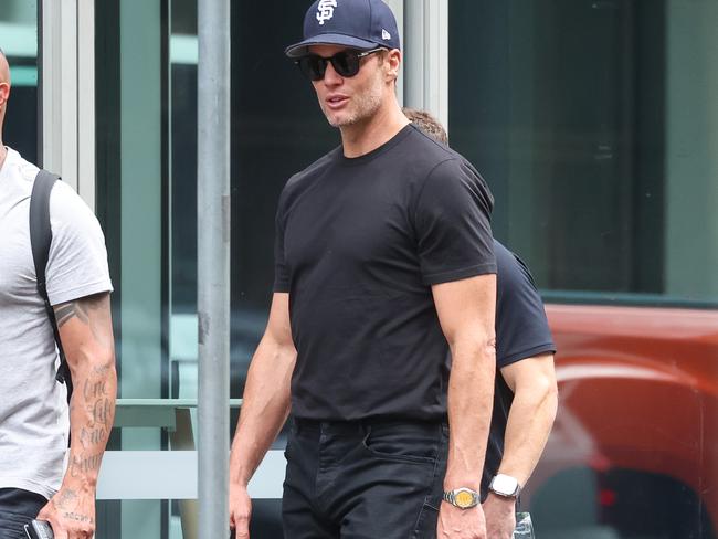 Tom Brady is seem walking along Southbank and into the city.