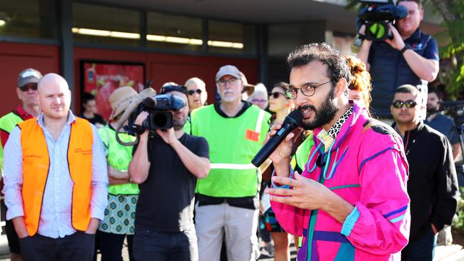 Greens councillor Jonathan Sri leads a blockade at the corner of Montague Rd and Victoria S, West End, highlighting the need for traffic lights. The Budget has set aside $11 million to install lights. Picture: Liam Kidston