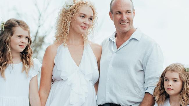 Popular yoga teacher and businesswoman Lauren Verona on her wedding day in February 2022, pictured with her daughters Allira (left) and Evie and husband Ryan Gaylard. Tragically, Lauren died after giving birth to her third daughter Lucinda in June. Photo: Facebook