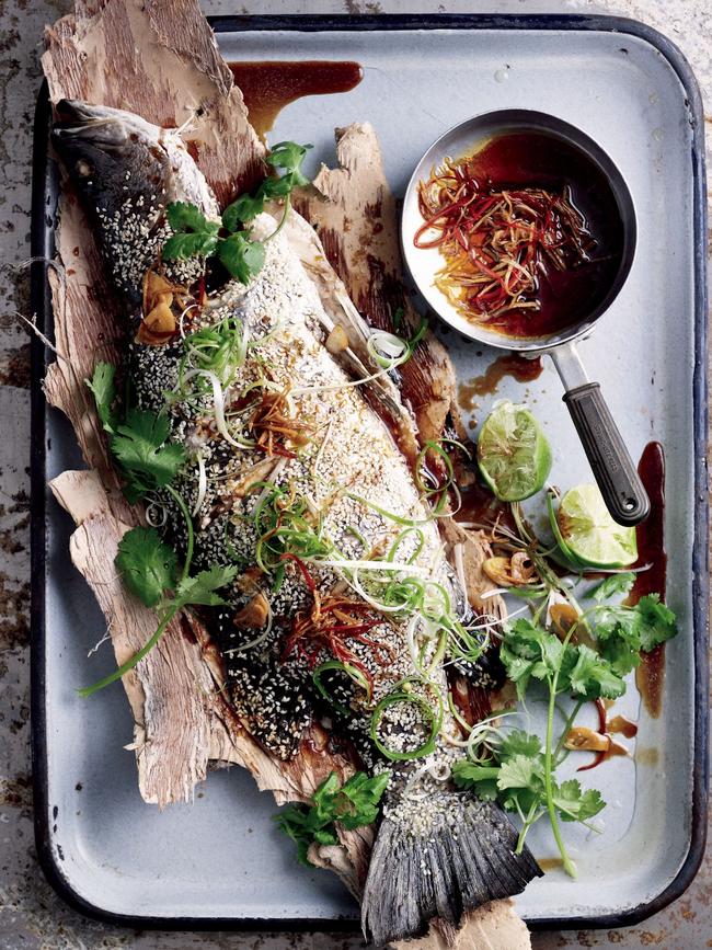 Roasted whole barramundi with ginger and soy dressing. Picture: Mark O’Meara