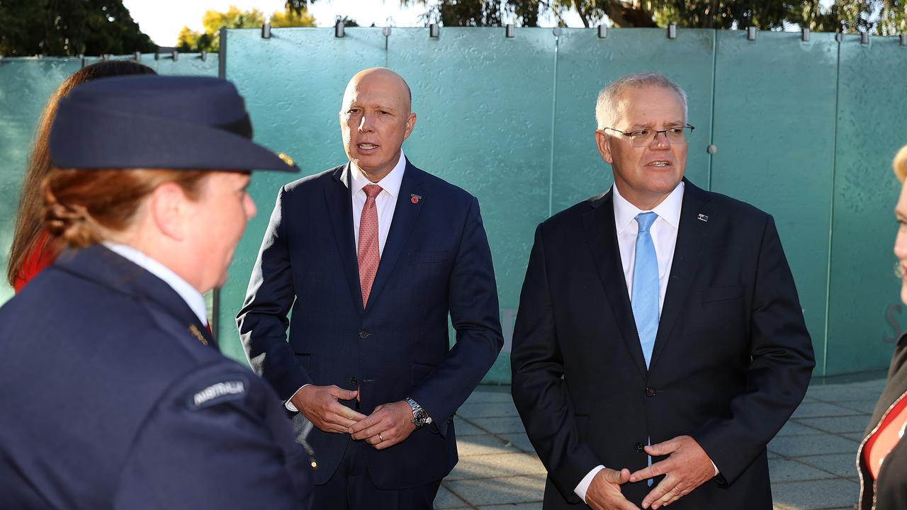 Mr Dutton and Mr Morrison thanked military nurses for their service. Picture: NCA NewsWire / Gary Ramage