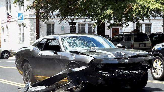 The Dodge Challenger allegedly driven by James Alex Fields Jr. passes near the Market Street Parking Garage moments after driving into a crowd of counter-protesters on Water Street in Charlottesville, Virginia in 2017. Picture: Matthew Hatcher/Getty Images North America