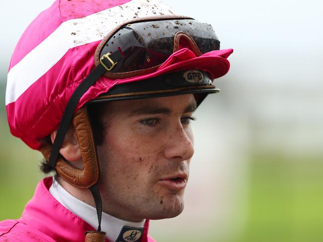 NEWCASTLE, AUSTRALIA - MAY 11: Tyler Schiller riding Navy Blood wins Race 2 Midway during "The Coast Raceday" - Sydney Racing at Newcastle Racecourse on May 11, 2024 in Newcastle, Australia. (Photo by Jeremy Ng/Getty Images)