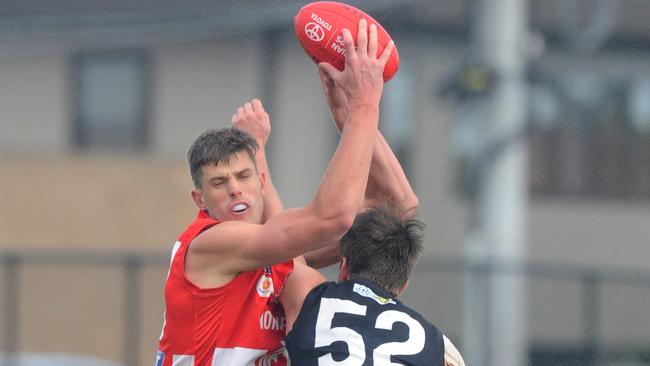 Carlton-listed ruckman Cameron Wood takes a mark for Northern Blues in front of Collingwood’s Lachlan Wallace in the VFL last weekend. Photo: Andrew Henshaw