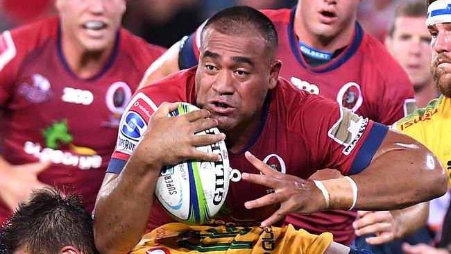 BRISBANE, AUSTRALIA - MARCH 10:  Caleb Timu of the Reds attempts to break through the defence during the round four Super Rugby match between the Reds and the Bulls at Suncorp Stadium on March 10, 2018 in Brisbane, Australia.  (Photo by Bradley Kanaris/Getty Images)