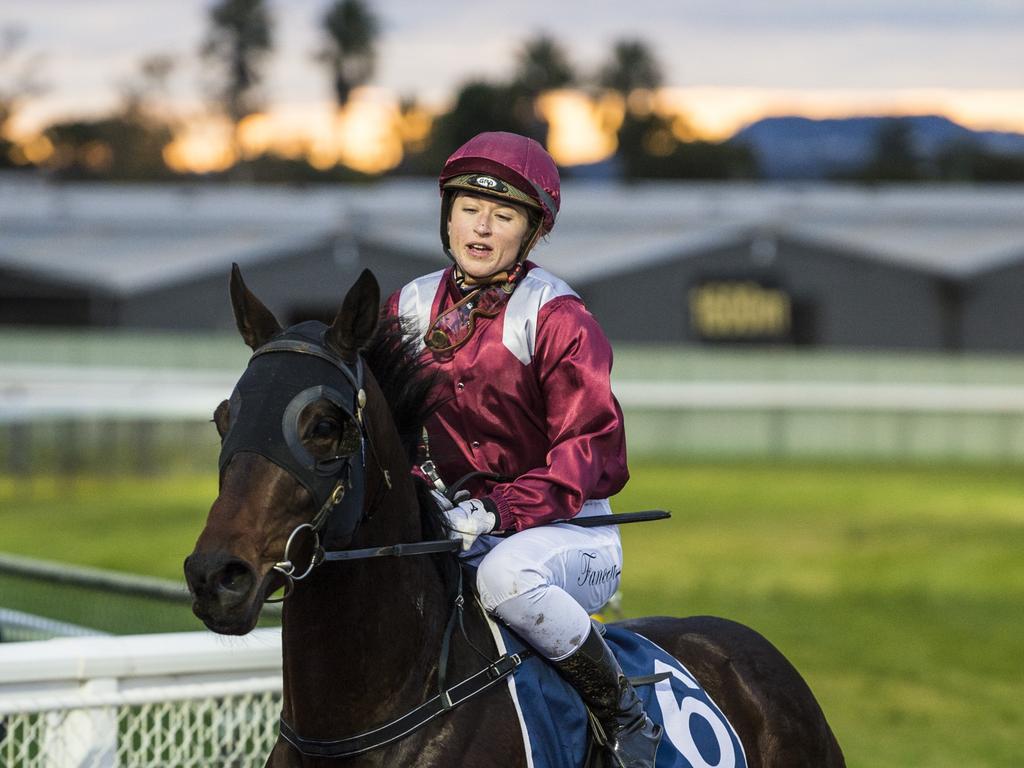 Jockey Alannah Fancourt returns to the winners stall on Chevrons'n'rockers after race one at Clifford Park Racecourse, Saturday, June 19, 2021. Picture: Kevin Farmer