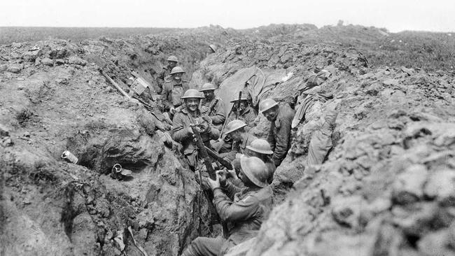 Australians clean their rifles in the second line of  trenches near Bullecourt. Picture: Australian War Memorial (E00454)