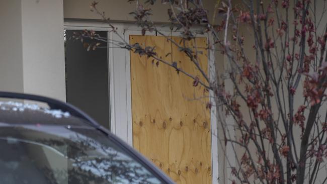 A boarded up door at the Glen Osmond home. Picture: RoyVPhotography