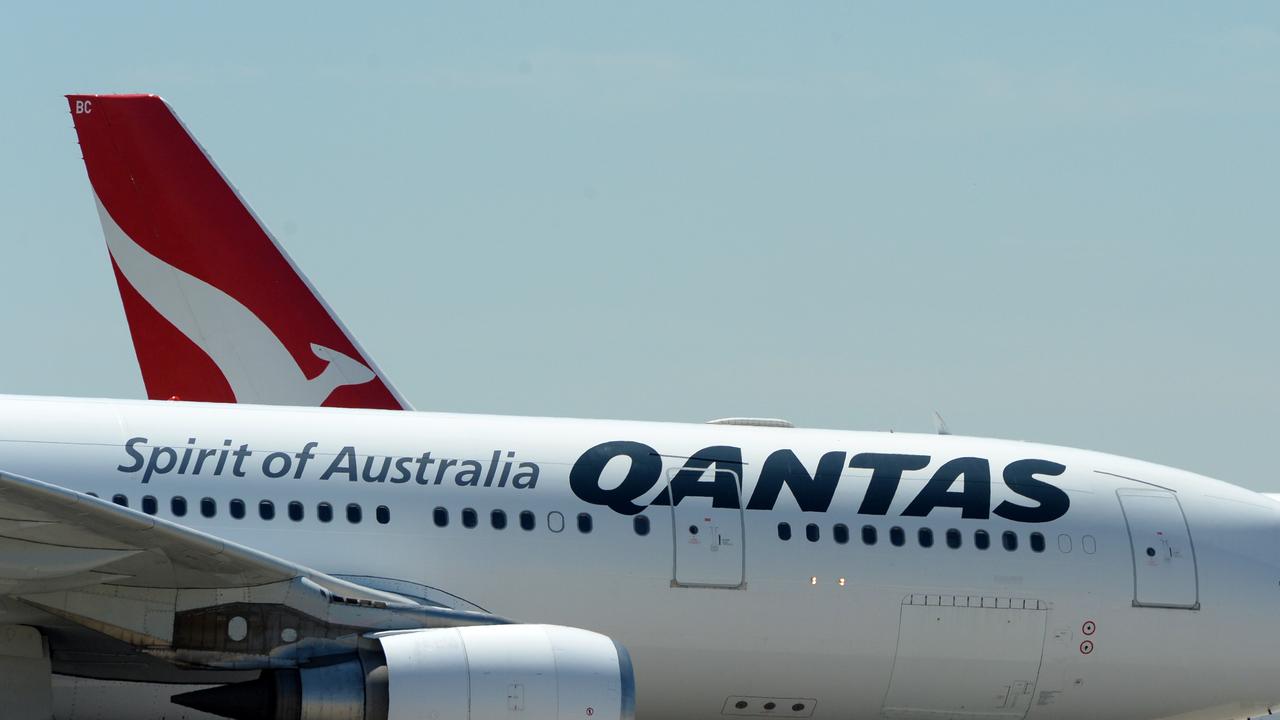 A woman waited on a tarmac for hours. Picture: NCA NewsWire / Andrew Henshaw