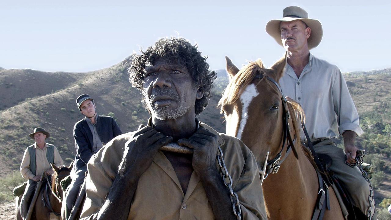 David Gulpilil with fellow actor Gary Sweet, right, in a scene from The Tracker.