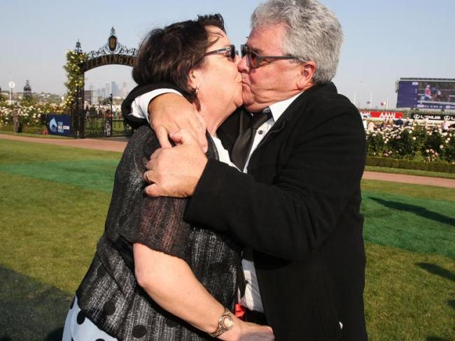 Damien Murnane, the lucky ambassador for Mystic Journey, kisses his wife Jenny. Picture: Michael Klein